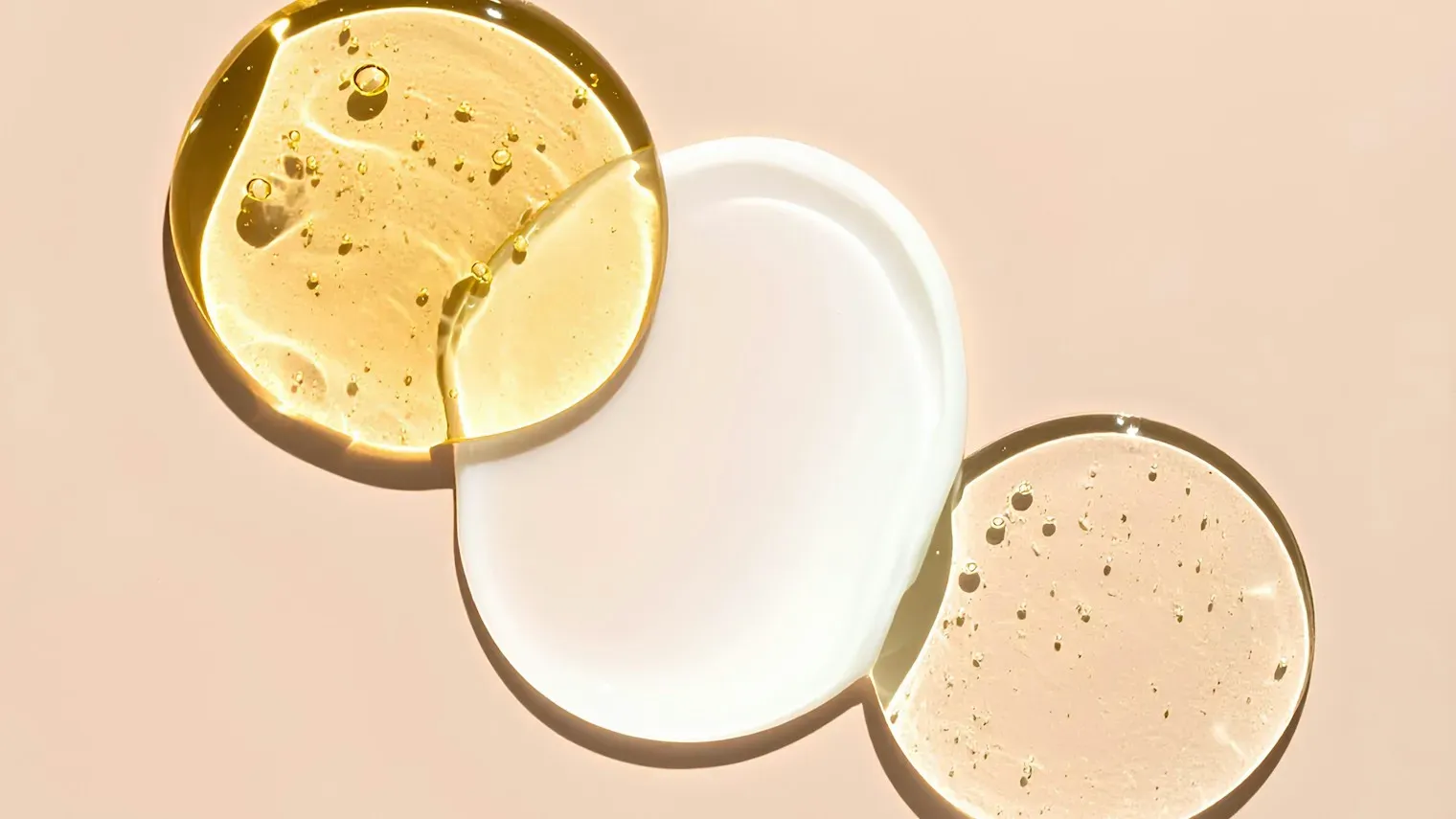 Three skincare textures side by side: oil serum, cream and gel